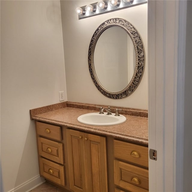 bathroom featuring tile patterned floors and vanity