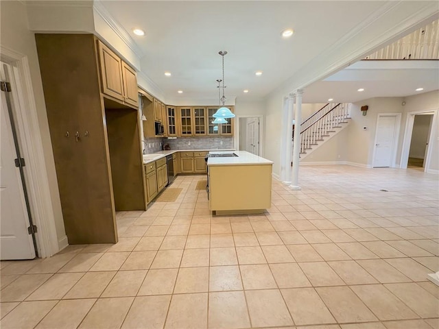 kitchen with stainless steel dishwasher, decorative backsplash, a center island, and light tile patterned floors