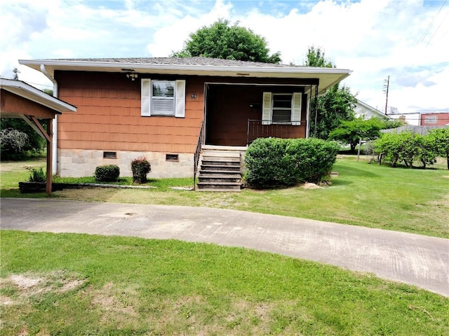 735 Willow St, Alexander City, AL 35010 - bungalow-style house with stairs, a shingled roof, a front lawn, crawl space, and covered porch