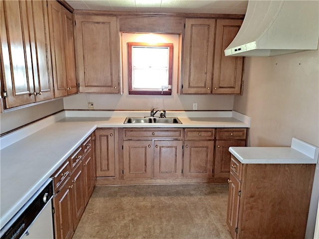 735 Willow St, Alexander City, AL 35010 - kitchen with white dishwasher, light tile patterned flooring, ventilation hood, a sink, and light countertops