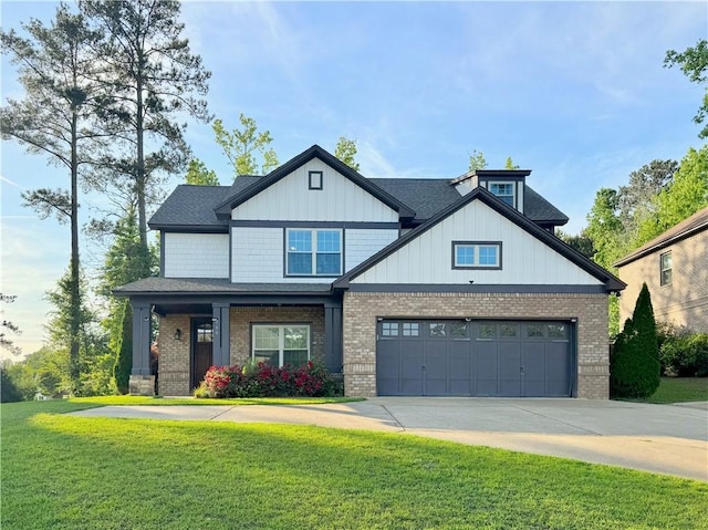 view of front of property featuring brick siding, a front lawn, concrete driveway, and covered porch