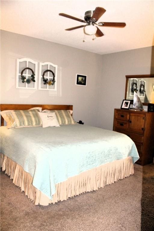 346 Waverly Ln, Jacksons Gap, AL 36861 - bedroom featuring dark carpet and a ceiling fan