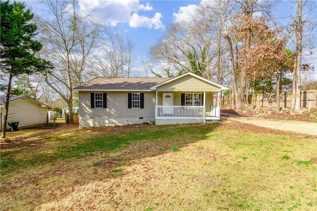 ranch-style home with a porch and a front lawn