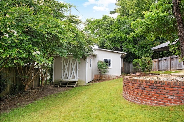 2 Lakewood Cir, Phenix City, AL 36867 - fenced backyard featuring an outbuilding