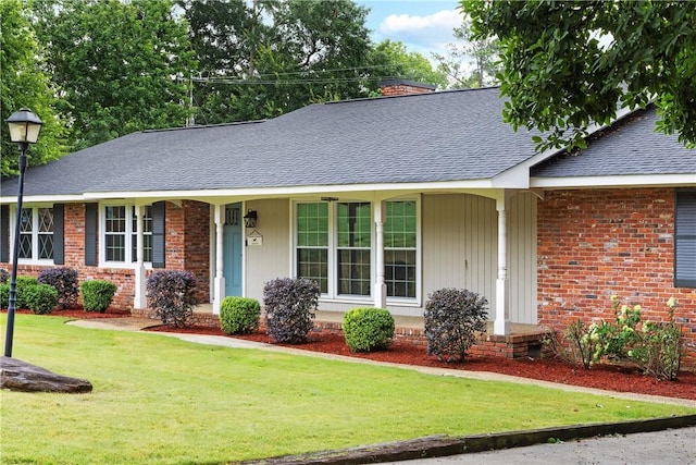2 Lakewood Cir, Phenix City, AL 36867 - ranch-style home with a shingled roof, a front lawn, brick siding, and a chimney