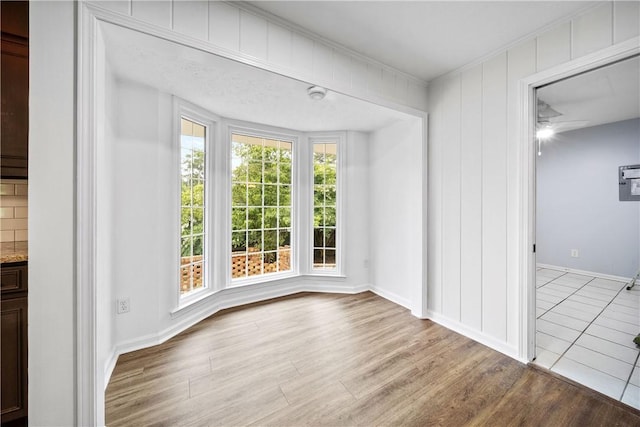 2 Lakewood Cir, Phenix City, AL 36867 - unfurnished dining area featuring wood finished floors and a ceiling fan