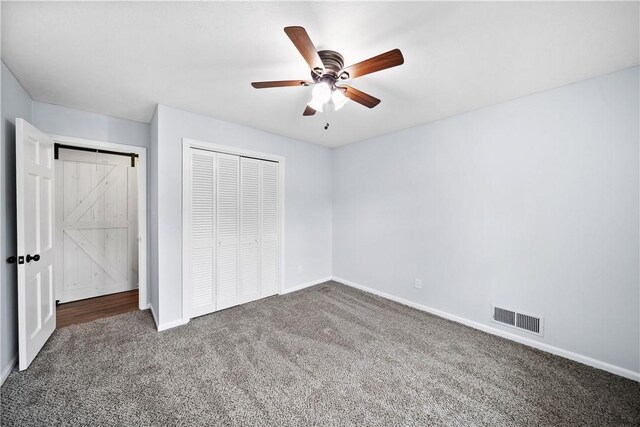 2 Lakewood Cir, Phenix City, AL 36867 - unfurnished bedroom featuring carpet flooring, a closet, and a ceiling fan