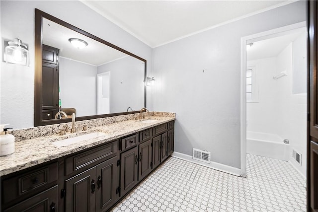 2 Lakewood Cir, Phenix City, AL 36867 - bathroom featuring ornamental molding, double vanity, and tub / shower combination