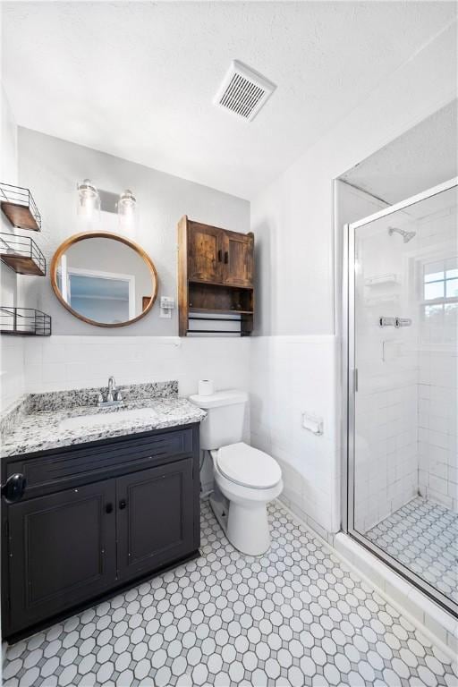 2 Lakewood Cir, Phenix City, AL 36867 - full bath featuring vanity, a shower stall, and wainscoting