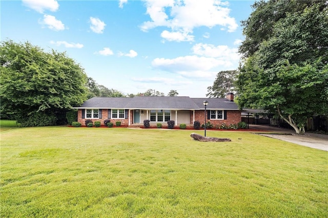 2 Lakewood Cir, Phenix City, AL 36867 - ranch-style home with a porch, brick siding, a front lawn, concrete driveway, and a chimney