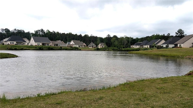 view of water feature with a residential view