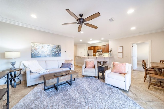 living room featuring light tile patterned floors, ceiling fan, and crown molding