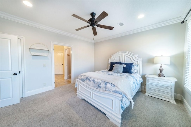 bedroom featuring ceiling fan, light colored carpet, and ornamental molding