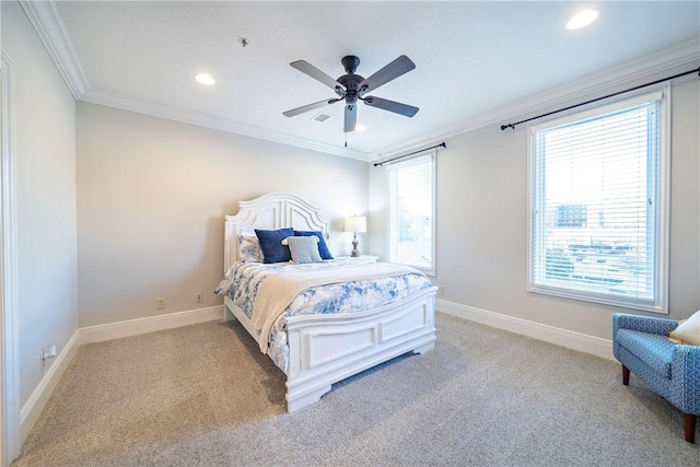 bedroom with ceiling fan, ornamental molding, and light carpet