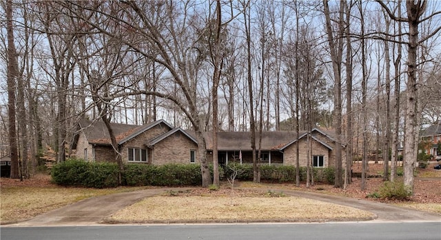 single story home with brick siding