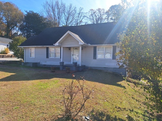 view of front of home with a front yard