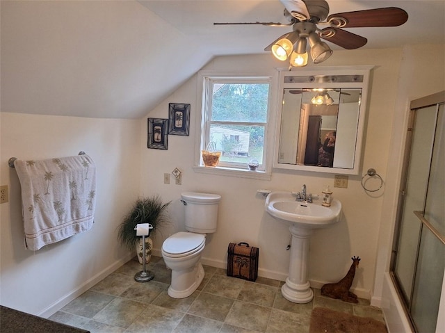 bathroom with toilet, ceiling fan, lofted ceiling, and enclosed tub / shower combo