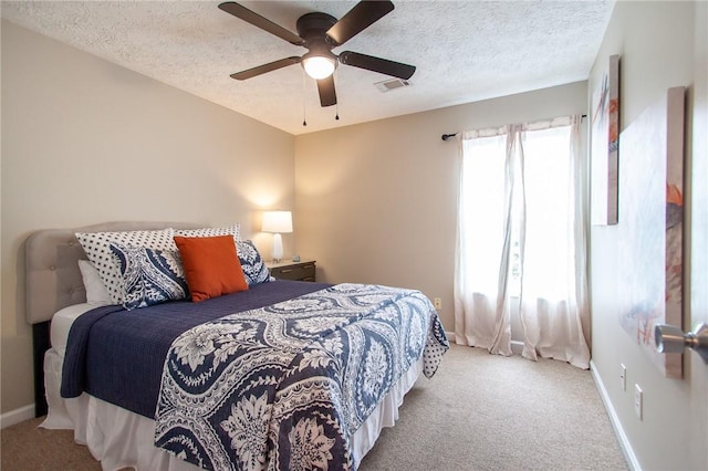 303 N Ross Ave Unit 215, Auburn, AL 36830 - bedroom featuring carpet flooring, a textured ceiling, and ceiling fan