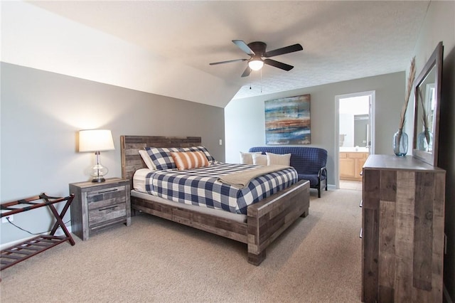 303 N Ross Ave Unit 215, Auburn, AL 36830 - bedroom featuring light colored carpet, ceiling fan, vaulted ceiling, and ensuite bath