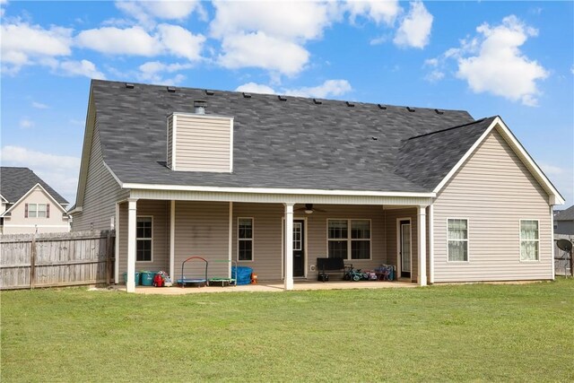 87 Seminole Trl, Ft Mitchell, AL 36856 - rear view of property with a patio, a shingled roof, and a ceiling fan