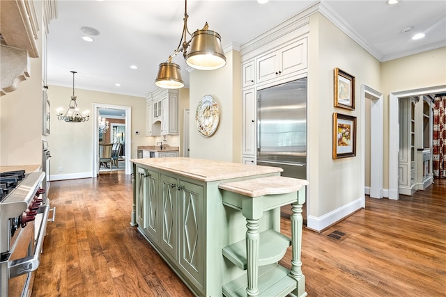 1601 Tanyard Rd, Lanett, AL 36863 - kitchen featuring green cabinets, premium appliances, white cabinets, light countertops, and ornamental molding