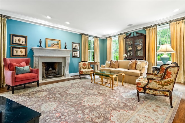 1601 Tanyard Rd, Lanett, AL 36863 - living room with wood finished floors, crown molding, a fireplace, and recessed lighting