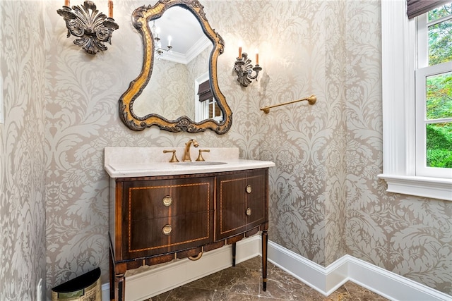 1601 Tanyard Rd, Lanett, AL 36863 - bathroom with wallpapered walls, vanity, marble finish flooring, and ornamental molding