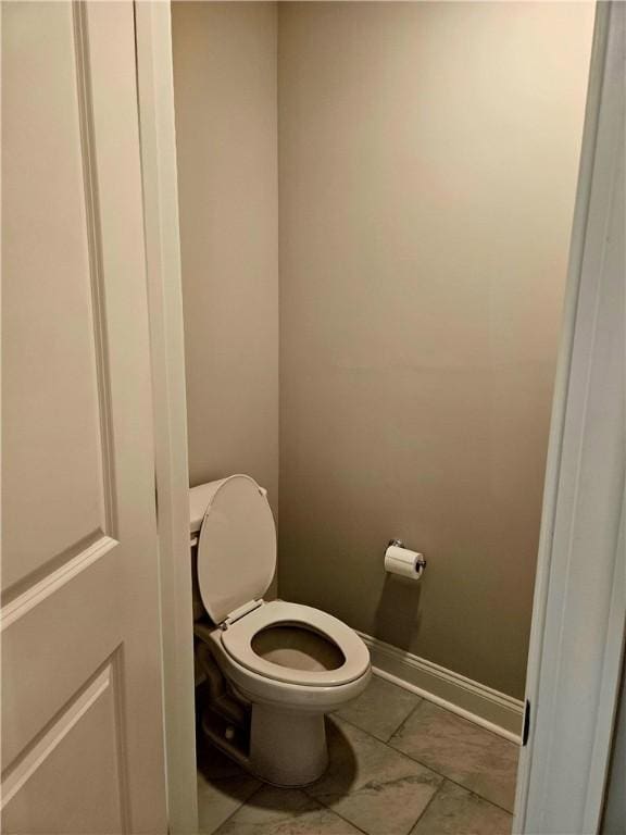 bathroom featuring toilet