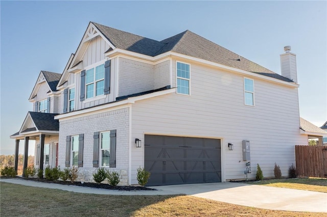 view of side of home with a garage