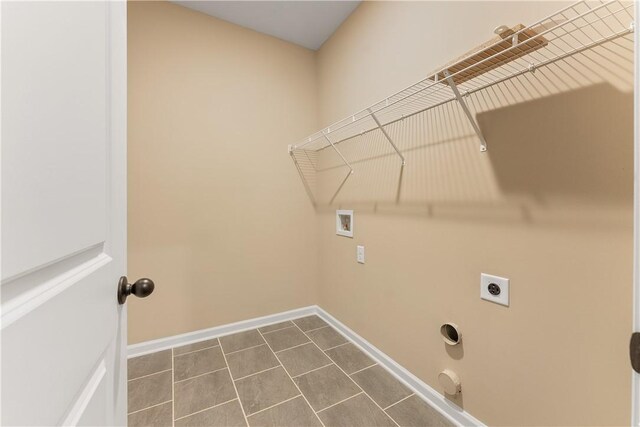 42 Lee Road 2234, Smiths Station, AL 36877 - washroom with hookup for a washing machine, hookup for an electric dryer, and dark tile patterned flooring