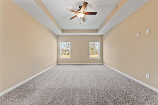 42 Lee Road 2234, Smiths Station, AL 36877 - unfurnished room featuring a ceiling fan, a raised ceiling, and light colored carpet