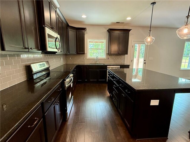 42 Lee Road 2234, Smiths Station, AL 36877 - kitchen with appliances with stainless steel finishes, plenty of natural light, dark wood finished floors, and recessed lighting