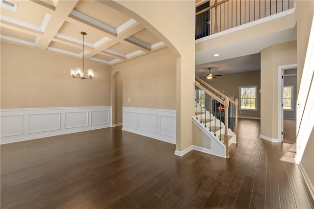 42 Lee Road 2234, Smiths Station, AL 36877 - entryway featuring arched walkways, a chandelier, dark wood-type flooring, beamed ceiling, and stairway