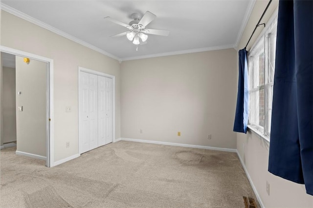 unfurnished bedroom with light carpet, crown molding, visible vents, and baseboards