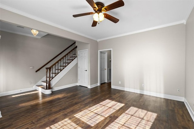 unfurnished room with dark wood-type flooring, ornamental molding, baseboards, and stairs