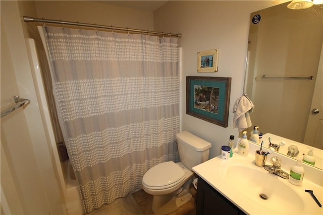 full bathroom with tile patterned flooring, vanity, shower / tub combo, and toilet