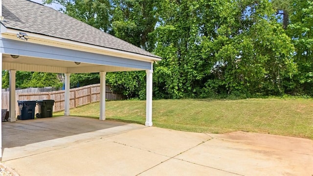 2514 Churchill Cir, Auburn, AL 36832 - view of patio featuring a carport and driveway