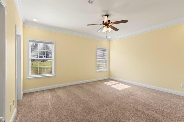 2514 Churchill Cir, Auburn, AL 36832 - carpeted empty room featuring crown molding, healthy amount of natural light, baseboards, and ceiling fan