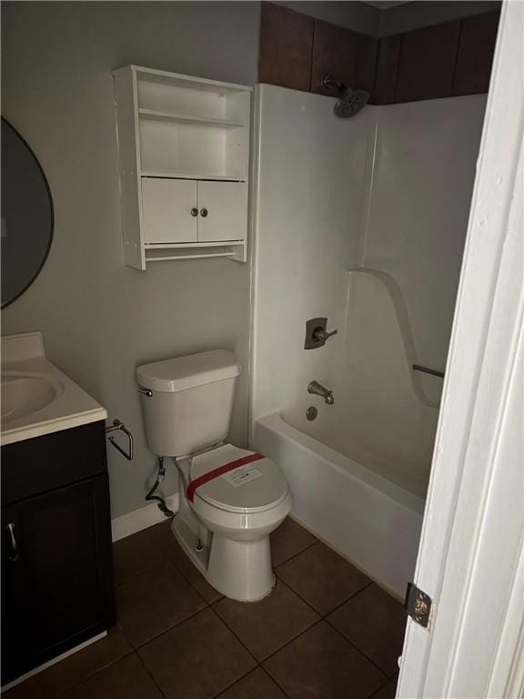 full bathroom featuring tile patterned flooring, vanity, toilet, and tub / shower combination