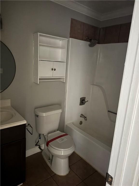 full bathroom featuring vanity, tile patterned floors, crown molding, toilet, and shower / bath combination