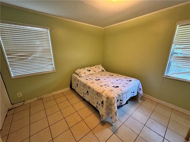 tiled bedroom featuring ornamental molding