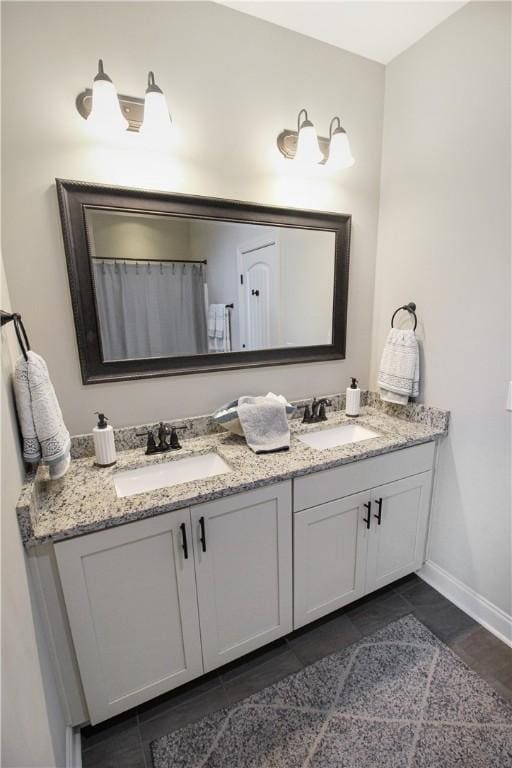 3855 Academy Dr Unit 402, Opelika, AL 36801 - full bathroom featuring double vanity and tile patterned flooring