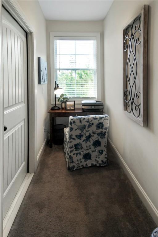 3855 Academy Dr Unit 402, Opelika, AL 36801 - sitting room with baseboards and carpet flooring
