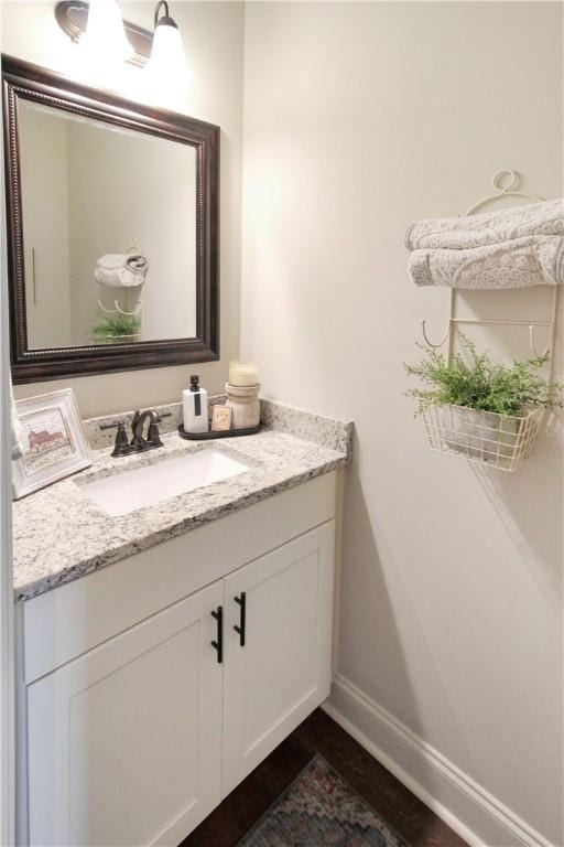 3855 Academy Dr Unit 402, Opelika, AL 36801 - bathroom featuring vanity and wood finished floors
