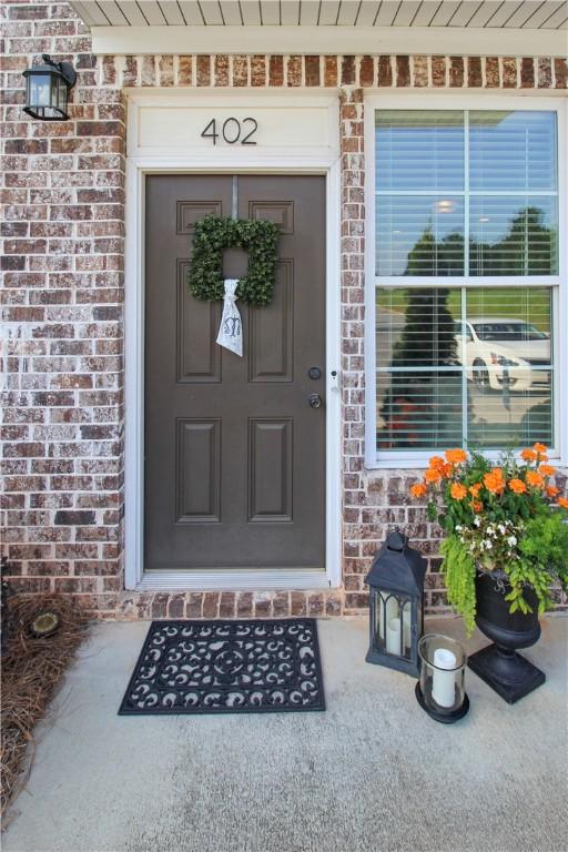 3855 Academy Dr Unit 402, Opelika, AL 36801 - view of exterior entry with brick siding