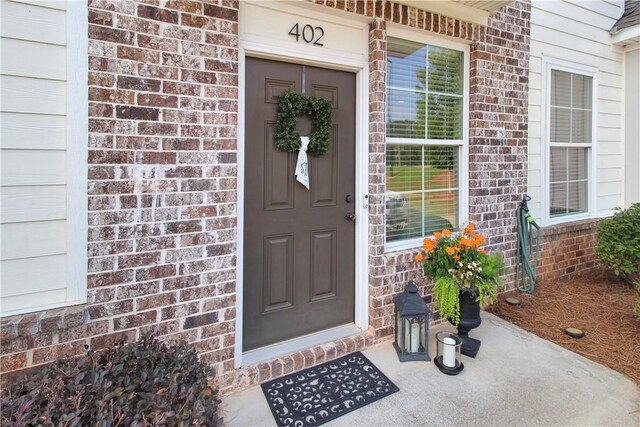 3855 Academy Dr Unit 402, Opelika, AL 36801 - doorway to property with brick siding