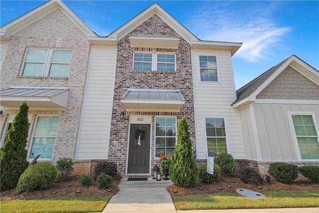 3855 Academy Dr Unit 402, Opelika, AL 36801 - view of front of house featuring brick siding and board and batten siding