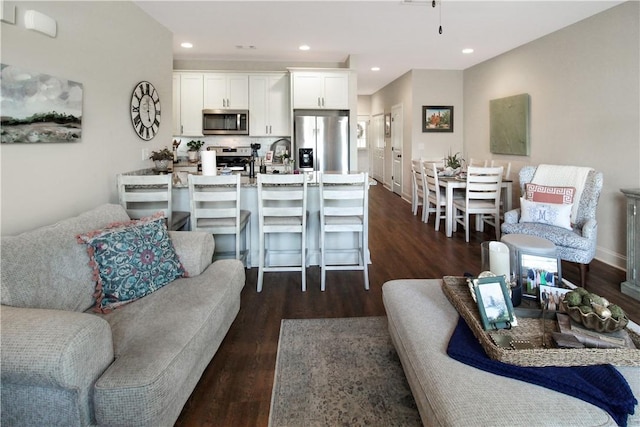 3855 Academy Dr Unit 402, Opelika, AL 36801 - living room featuring dark wood-style flooring and recessed lighting