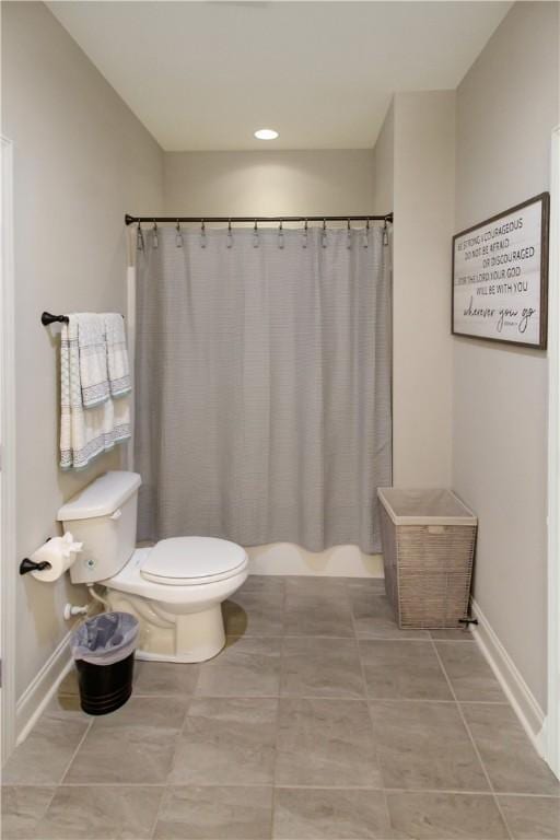 3855 Academy Dr Unit 402, Opelika, AL 36801 - full bathroom featuring a shower with shower curtain, tile patterned floors, and a tub