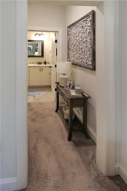 3855 Academy Dr Unit 402, Opelika, AL 36801 - corridor with light carpet and baseboards